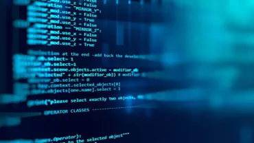 Close-up of computer code on a screen with a blue background.